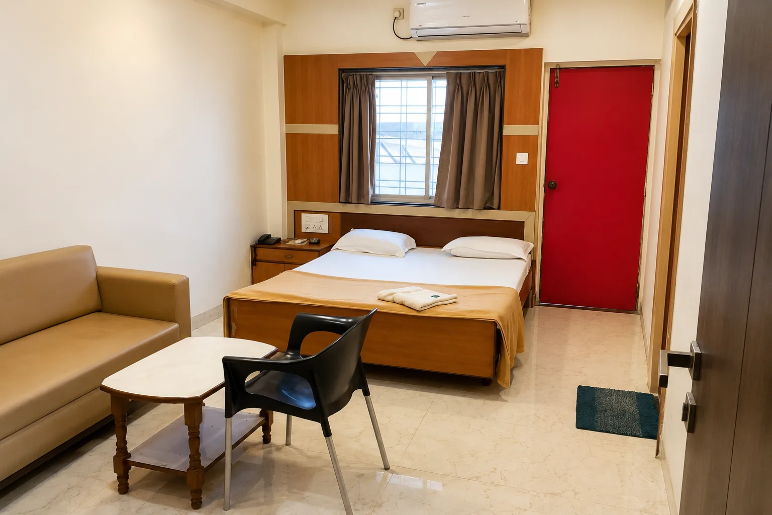Super Deluxe AC room at Hotel Sangram Palace